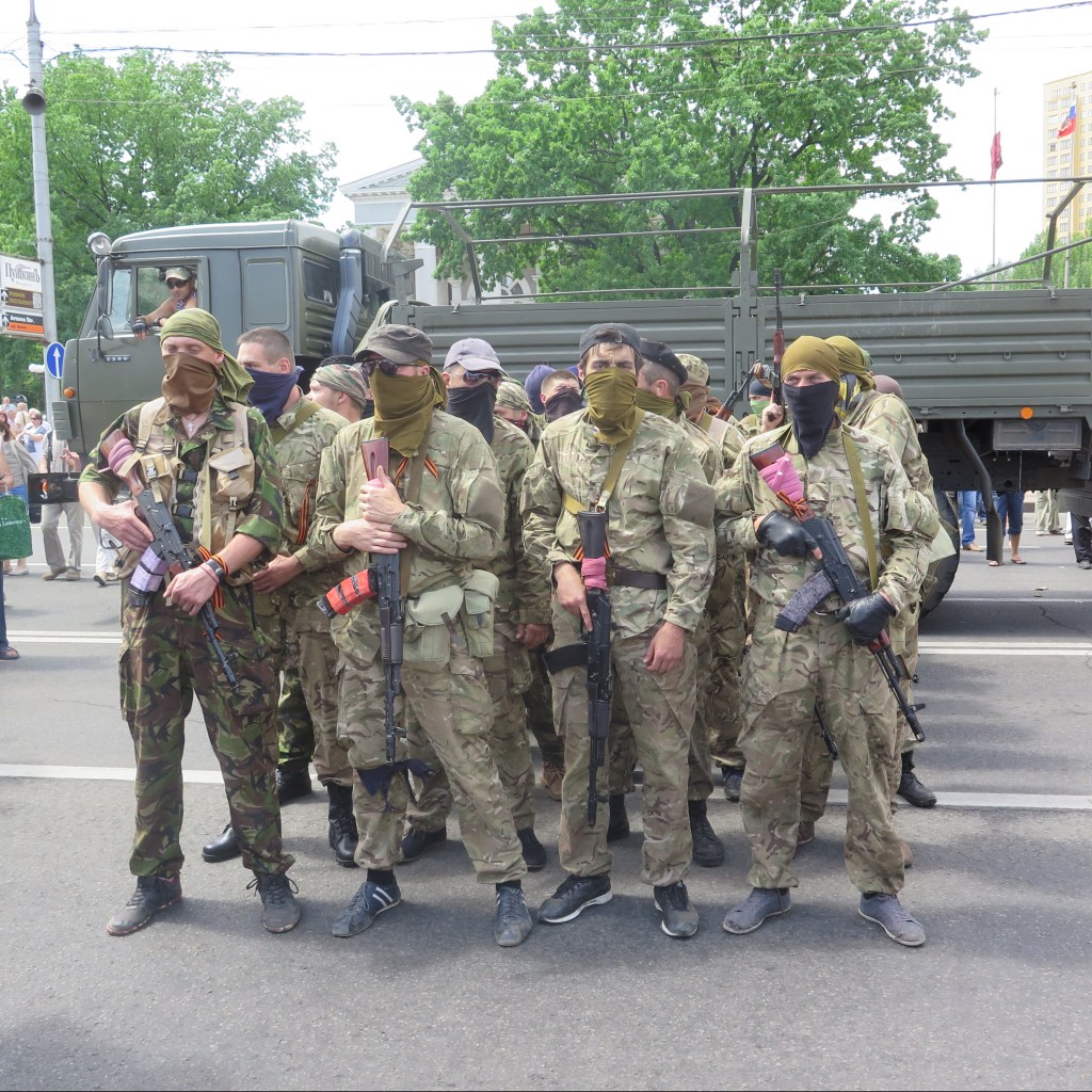 Armed men in masks